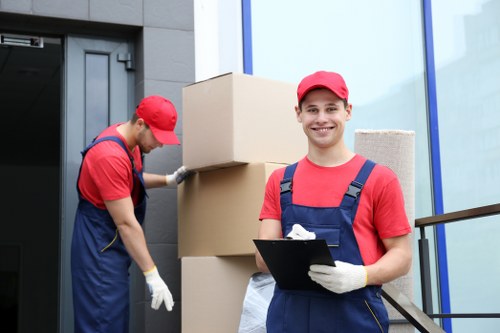 Removal team loading household goods for a moving service