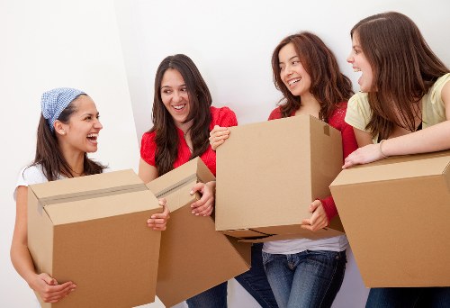 Removal crew loading a van for a Liverpool property move