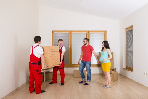 Furniture being carried during a residential move in Liverpool