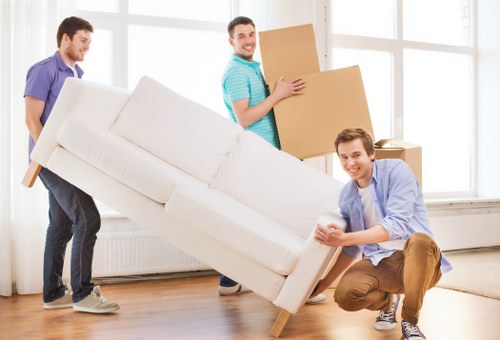 Commercial movers handling office furniture during relocation