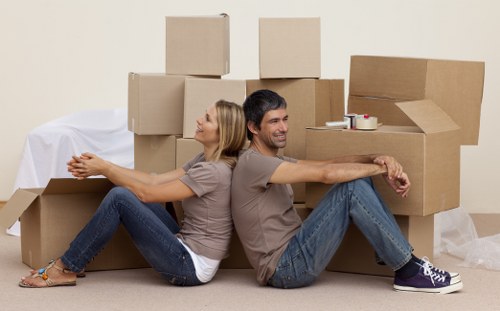 Local moving van loading furniture in Liverpool