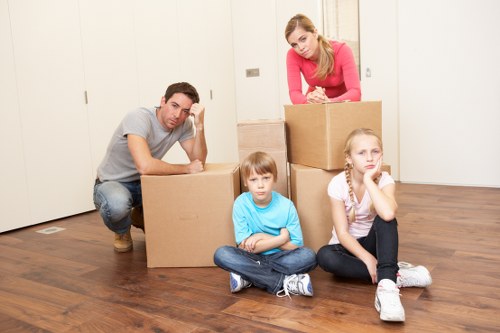 Careful lifting of boxes and furniture during a Liverpool move