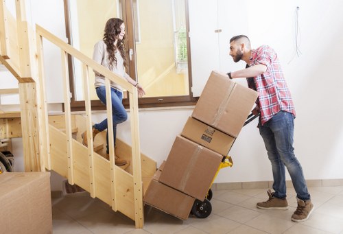 Local movers loading boxes for a city centre relocation in Liverpool