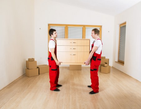 Furniture loading into a van for a Liverpool home move